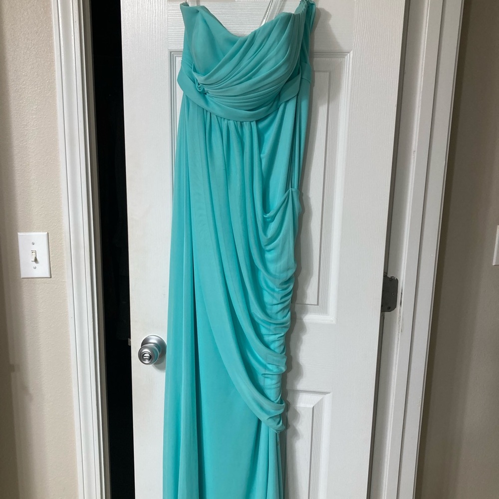 Sweetheart neckline maxi dress in light teal color.
